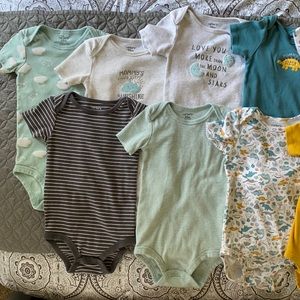 A pack of 15 Carter’s size 24M onesies